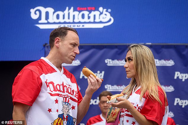 The two World Champions face off during the weigh-in ceremony