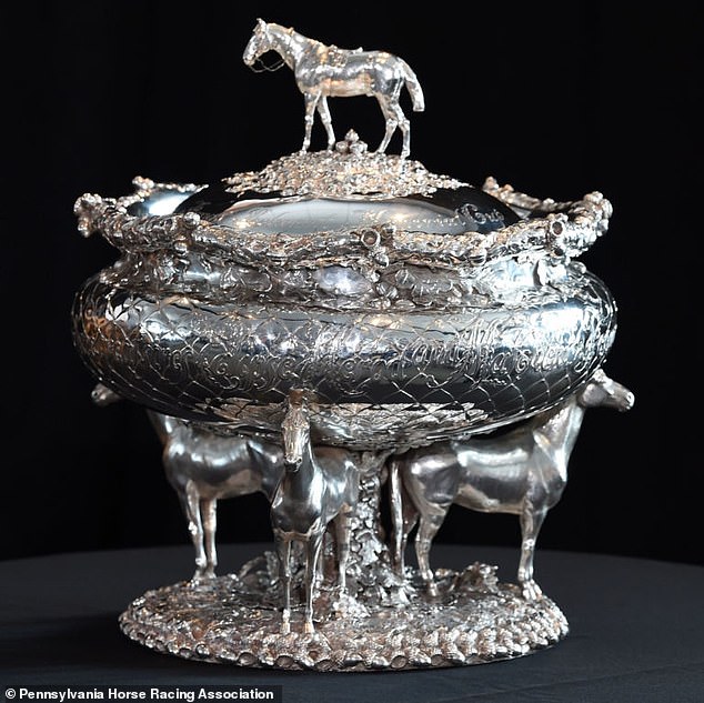 The thieves also allegedly stole an MVP trophy given to former baseball player Roger Maris,  and the 1903 Belmont Stakes Trophy (a different Belmont Trophy pictured above)