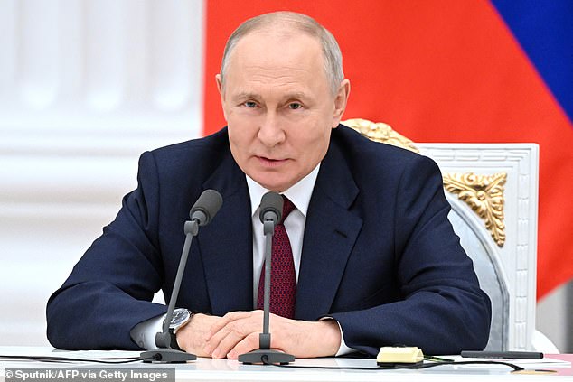 Vladimir Putin meets with alumni of the Russian Presidential Academy of National Economy and Public Administration (RANEPA) at the Kremlin in Moscow on July 4, 2023