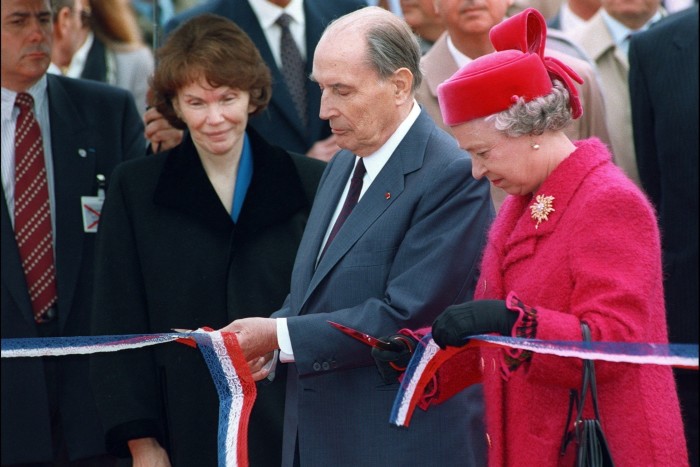 In 1994, French president François Mitterrand and Britain’s Queen Elizabeth II cut a ribbon at the inauguration of the Channel Tunnel in Coquelles, Pas-de-Calais, France