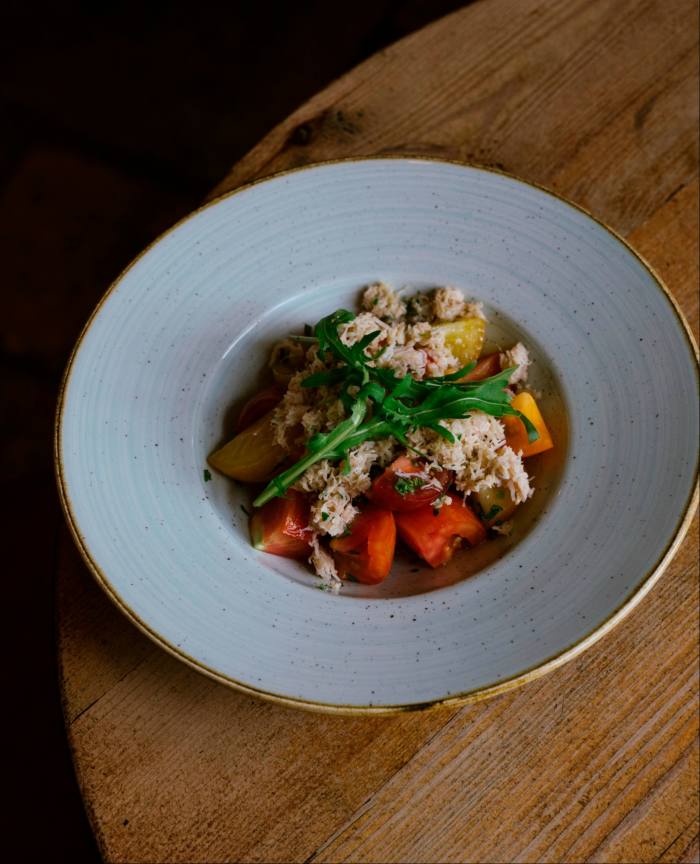 The all-day dining menu has dishes such as a summery Devon crab salad