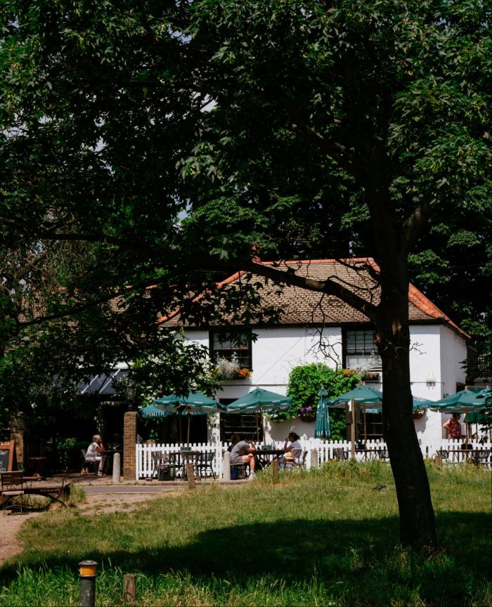 The Hand in Hand, with its peaceful front garden facing a green