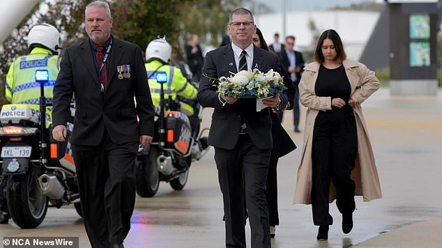 Eulogies were given by Constable Woods' brother Nathan, mother Natalie, childhood mates, colleagues from Belmont Police Station, and his wife Emily