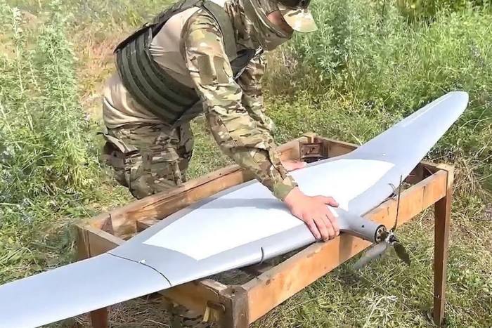 A Russian soldier launches an Albatross M5 drone in Ukraine