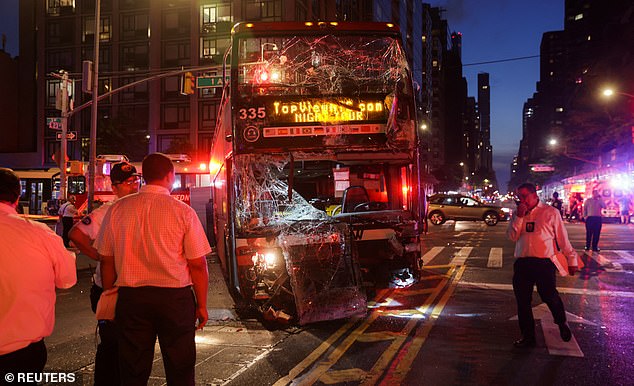 People are also seen being loaded into ambulances by emergency services, while others are seen visibly injured by the collision