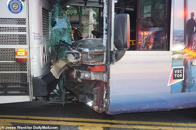 The windshield of the tour bus has been completely obliterated following the incident earlier tonight