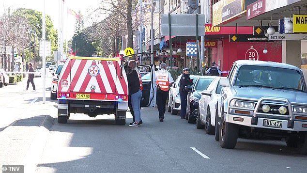 Emergency services were called to a business on Marrickville Road in Marrickville, after reports shots had been fired just before 2pm on Friday