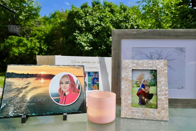 Pictures of a young girl, a candle, and a drawing off a tree. 