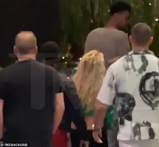 Before: A clip obtained by TMZ shows the moments leading up to the shock incident outside Catch restaurant in the ARIA Hotel, Las Vegas on Wednesday - with Britney, 41, running up to Victor, 19, and exclaiming 'sir, sir, sir!' in a British accent before tapping him on the shoulder