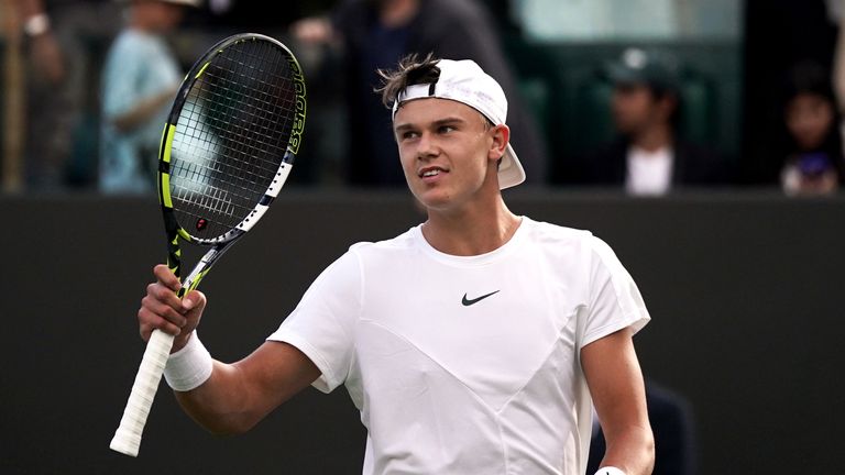 Holger Rune celebrates victory over George Loffhagen on day three of the 2023 Wimbledon Championships at the All England Lawn Tennis and Croquet Club in Wimbledon. Picture date: Wednesday July 5, 2023.