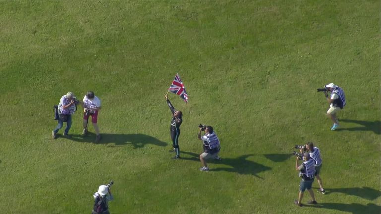 Lewis Hamilton celebrated with the British fans after winning a dramatic British Grand Prix by passing Charles Leclerc in the closing stages!