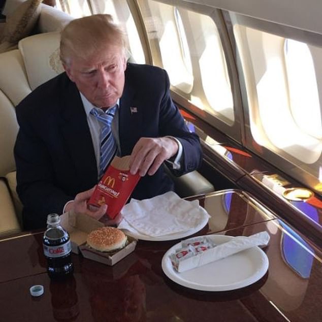 Donald Trump eating McDonalds burger and fries