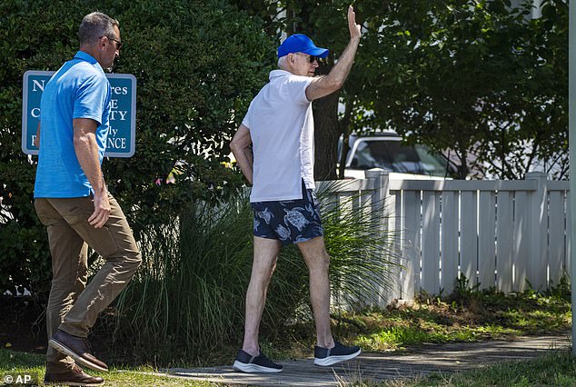 The president waved as he left the beach