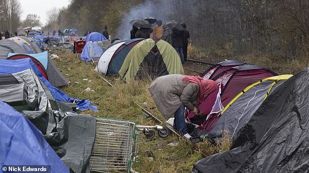 But he made his way back to the Channel in March 2022 where he was found by a reporter in a tent at the Grande Synthe camp (file photo of camp pictured), near Dunkirk, claiming he had 'changed his ways'