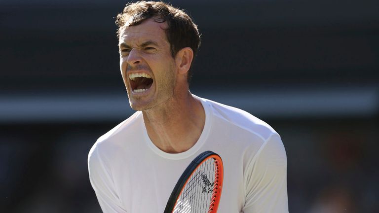 Andy Murray of the U.K. reacts after earning a point against Stefanos Tsitsipas of Greece during the gentlemen's singles second-round match in the Championships, Wimbledon at All England Lawn Tennis and Croquet Club in London, the United Kingdom on July 7, 2023. The match was postponed due to the closing time of the tournament on the previous day. ( The Yomiuri Shimbun via AP Images )