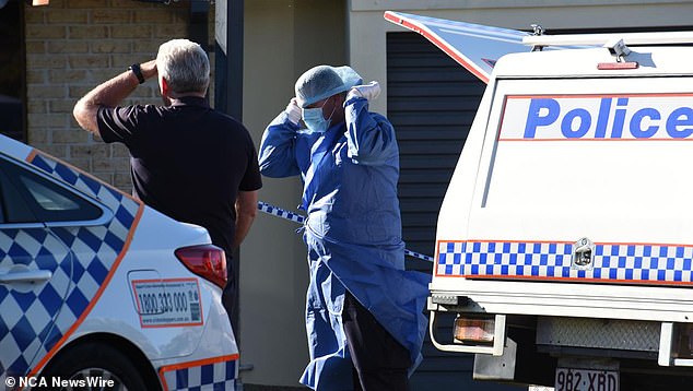 Police at the scene following Ms Wilkinson's death