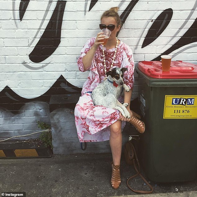 Ms Booth is pictured with Indi, who the couple welcomed into their family in 2016