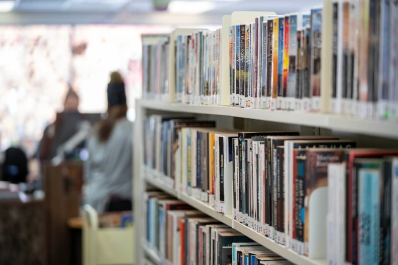 A bookshelf in a library