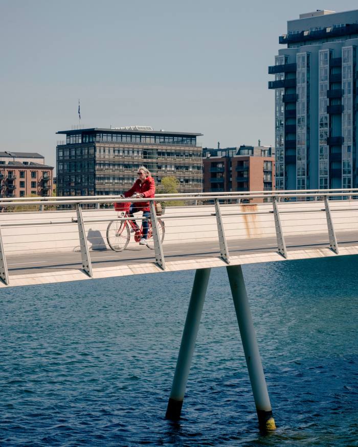 A cyclist crossing Copenhagen’s Bryggeboen bicycle bridge