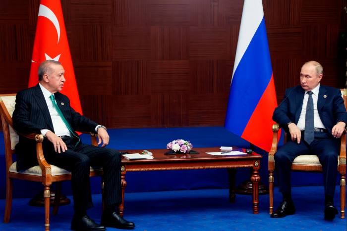 Russian President Vladimir Putin, right, meets his Turkish counterpart Recep Tayyip Erdoğan in Kazakhstan’s capital Astana on the sidelines of a regional summit in October 2022