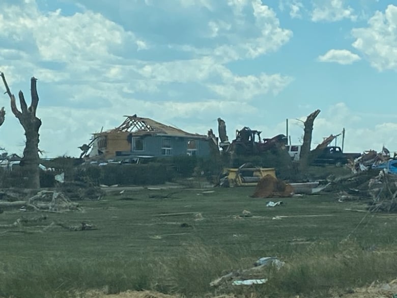 Houses damaged by a tornado are pictured. 