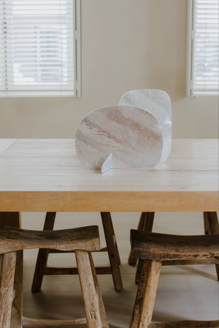 Kaki Persimmons by Isamu Noguchi, Van Duysen’s table design for Zara Home and Chinese rural stools