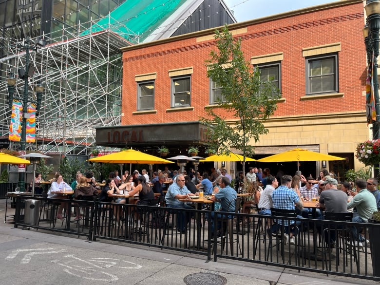 People sitting on a patio.