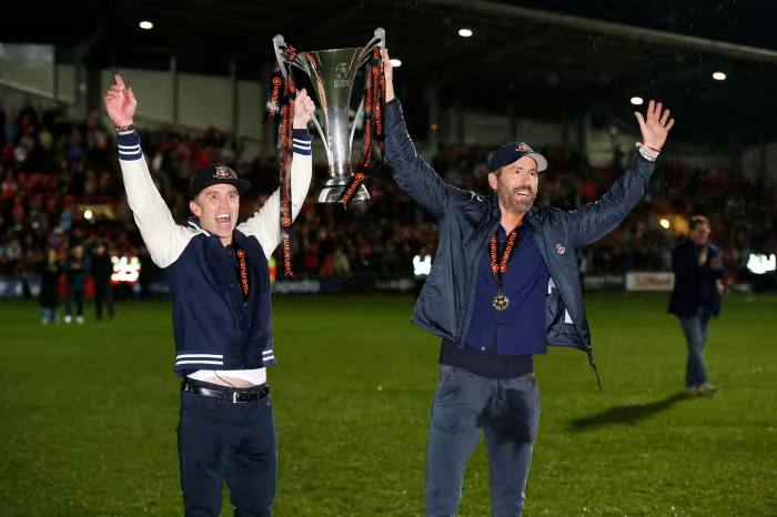 Hollywood actors Ryan Reynolds and Rob McElhenney after Wrexham are promoted 