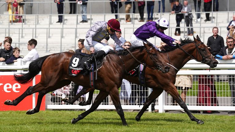 Bucanero Fuerte (far) holds off Unquestionable to win the Railway Stakes 