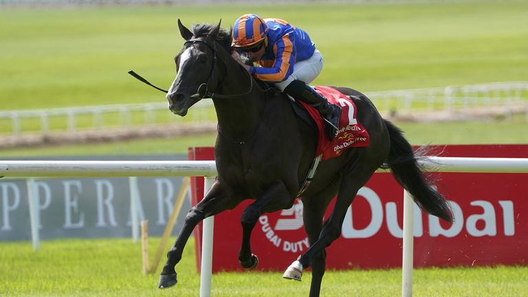 Auguste Rodin races to victory in the Irish Derby under Ryan Moore