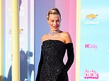 Margot Robbie ditches pink for Barbie world premiere in LA by recreating trumpet gown on 1960 doll