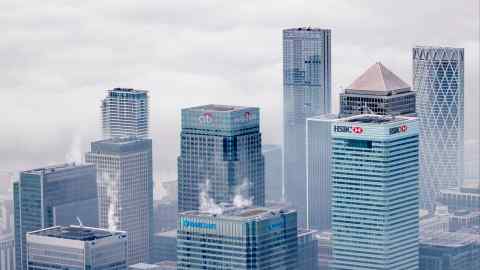 Aerial view of fog shrouding the towers of Canary Wharf banks