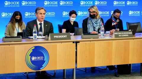 US secretary of state Antony Blinken, left, speaks at the OECD meeting in October 2021