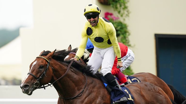 Neil Callan stands up in the saddle as Triple Time wins the Queen Anne Stakes at Royal Ascot