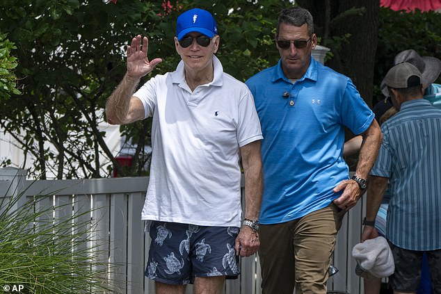 Sunny daze: Biden, 80, enjoys trip to Delaware beach with wife Jill and granddaughter Finnegan, 22