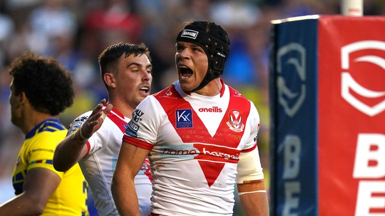 St Helens' Jonny Lomax celebrates scoring their third try of the game in their Super League win over Warrington Wolves