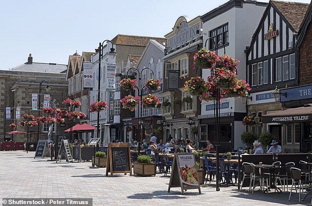 Unholy row breaks out in cathedral city of Salisbury over hanging baskets banning order