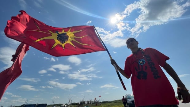 Supporters hold their ground at landfill blockade as noon deadline to leave passes