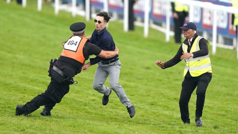 Derby protester Ben Newman spared jail after receiving suspended sentence for storming Epsom track | Racing News