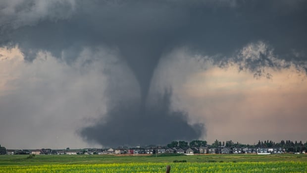 Alberta tornado witness says twister hit homes leaving damage, gas ‘spewing’ and power lines down