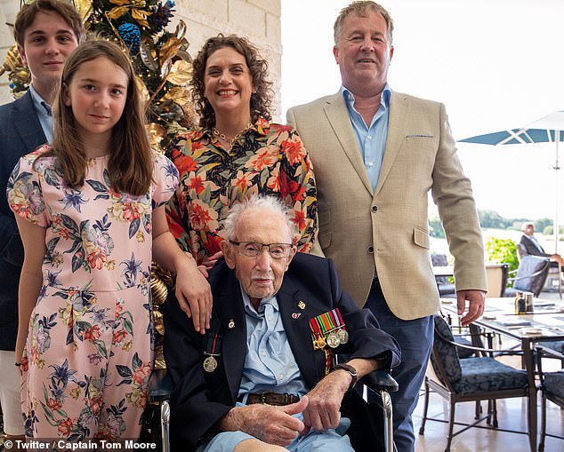 Sir Tom Moore (pictured front) along with his grandchildren Benji (left), Georgia (middle left), his daughter Hannah (middle right) and her husband Colin Ingram (right) while enjoying the Barbados sunshine in December 2020