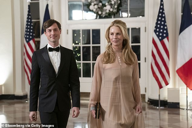 Laurene Powell Jobs, founder and president of the Emerson Collective, right, and Reed Jobs, arrive to attend a state dinner in honor of French President Emmanuel Macron