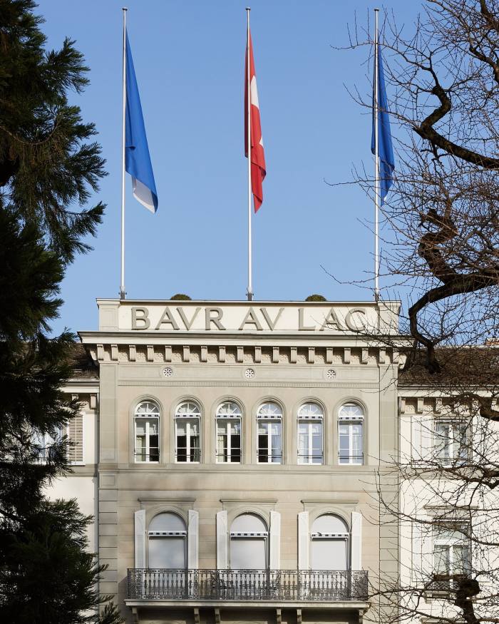 A detail of the grey-stone facade of Zürich’s 19th-century Baur au Lac hotel