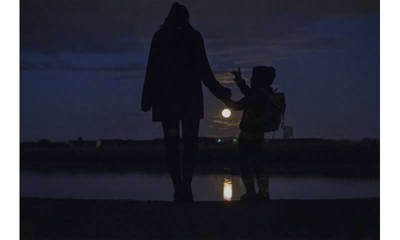 Photos: The first supermoon in August rises around the world