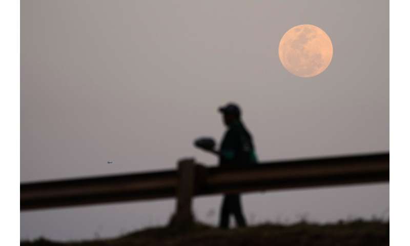 Rare blue supermoon dazzles stargazers around the globe