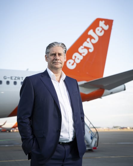 Johan Lundgren, the easyJet CEO, standing in front of one of the airline’s planes