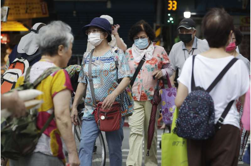 Typhoon Saola churns toward south China, suspending transport and delaying the school year