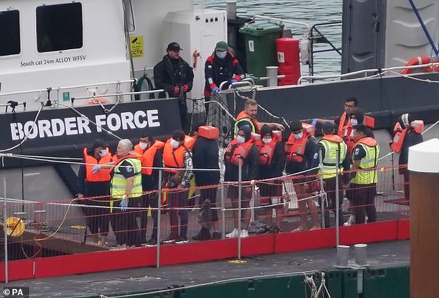 The number of migrants arriving in the UK after crossing the Channel recently topped 20,000. Pictured are migrants arriving at Dover