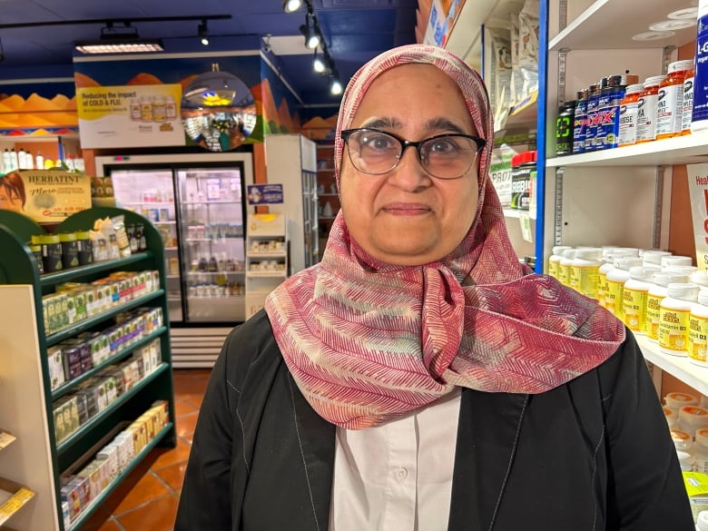 Wajihia Qureshi, manager of Nutrition House in Ottawa's Carlingwood Mall, is worried about Health Canada's new natural health product regulations.