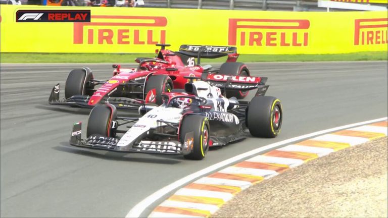 Making his debut for Alpha Tauri, Liam Lawson battles with Ferrari's Charles Leclerc at the Dutch GP.